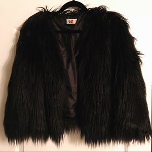 Short faux fur jacket.